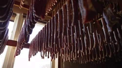 Cured Meats and Sausages Hanging to Dry