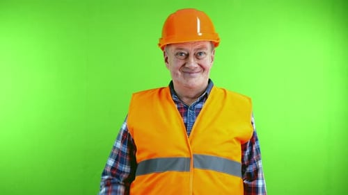 Senior Friendly Builder in Hardhat Waves Palm for Greeting or Goodbye Sign