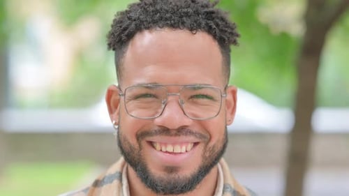 Close-up of a Smiling Multi Ethnic Man Face