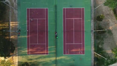Flying on the tennis court during a game Drone on the tennis court