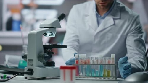 Biochemistry Specialist Making Expertise Drug Samples in Laboratory Close Up