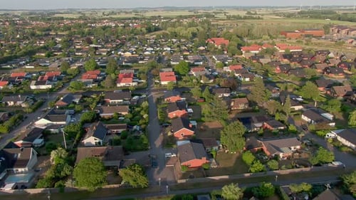 Aerial Footage Panning Left to Reveal a Rural Area on the Outskirts of a Swedish City