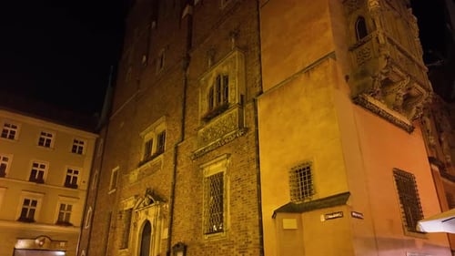 Night Time View of Wroclaw Old Town Hall in Market Square. Tilt Up Shot