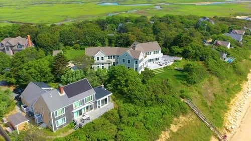 Panoramic Drone View of Spacious Coastal Homes and Marsh Vistas