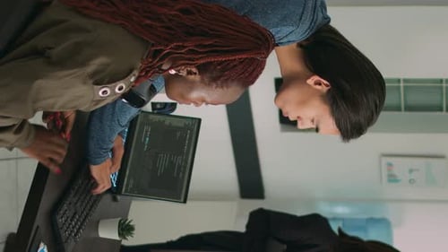Team Collaboration on Coding in Modern Office