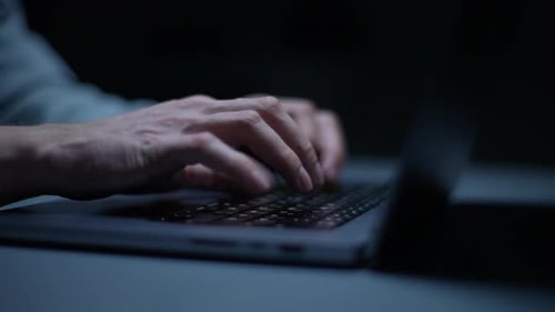 Detail Cropped Shot of Unrecognizable Hacker Programmer Working Typing on Keyboard Laptop Computer
