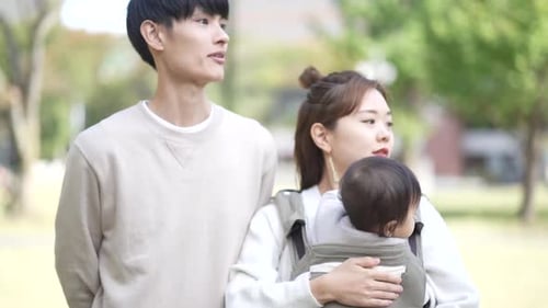 Parents and children walking in the park