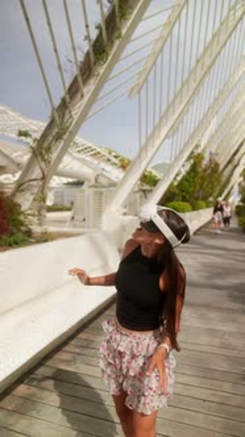 Woman Exploring Urban Park in Virtual Reality Headset
