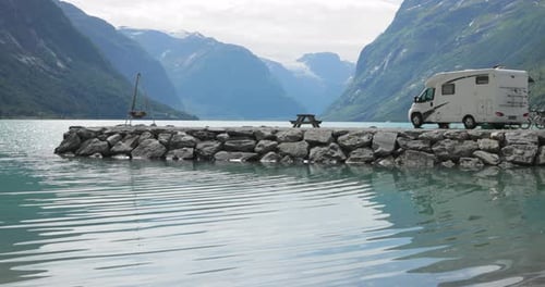 Family vacation travel RV, holiday trip in motorhome. Beautiful Nature Norway natural landscape.