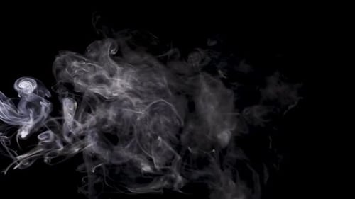 White smoke texture isolated on dark background.