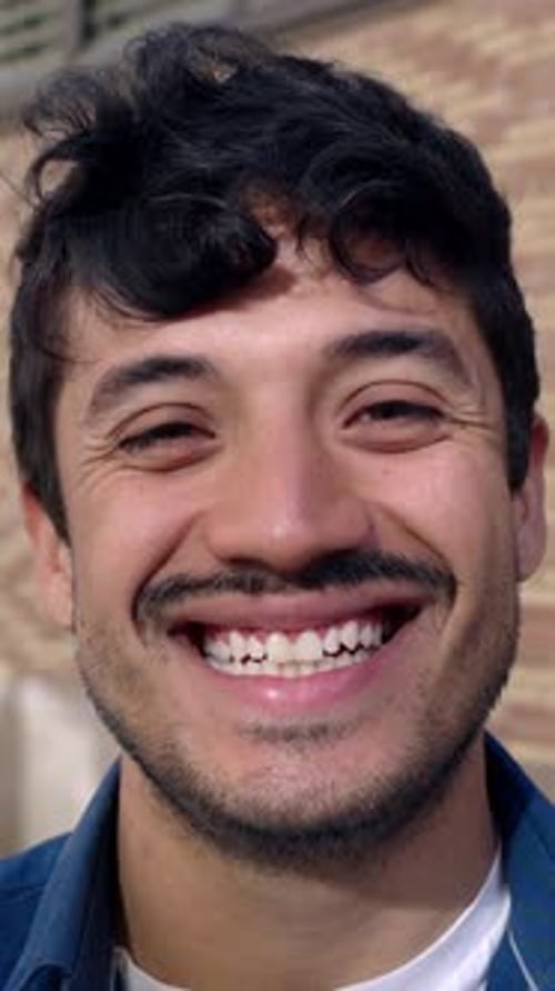 Smiling Young Adult Man in Close Up
