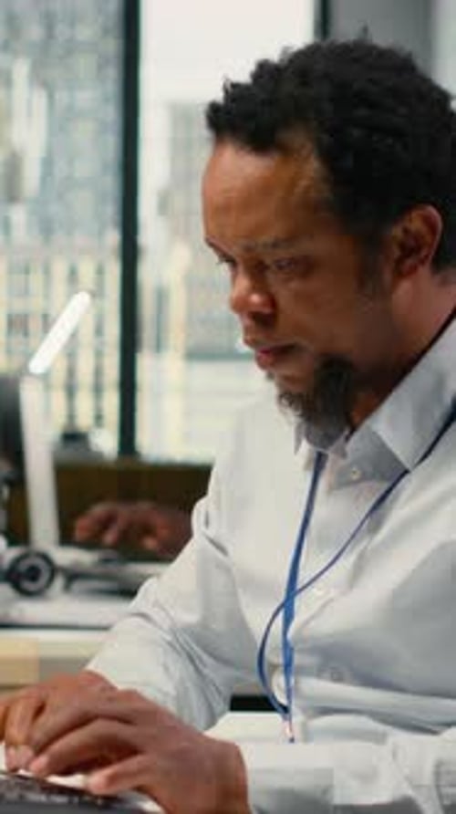 Vertical Video Computer Scientist Working in AI Startup Trains Predictive Models
