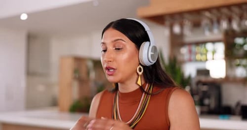 Laptop, freelance and woman on video call or webinar in home office with headphones and smile