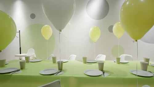 Set Table with Balloons Ready for Birthday Party