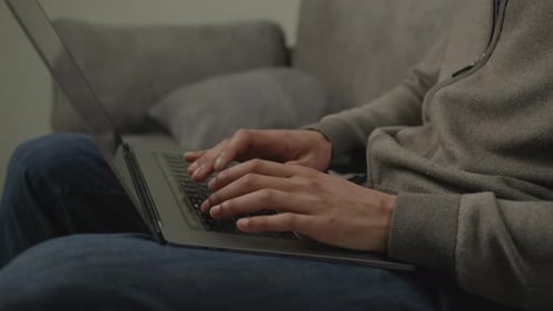 Black Male Hands Typing on Laptop Close Up African American Male Working Online at Home