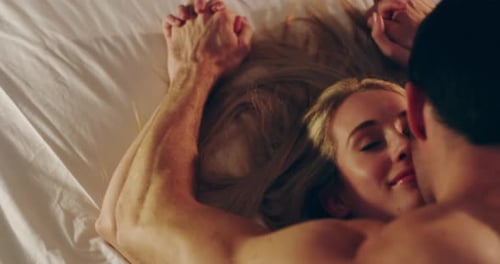 Loving Couple Embrace in Bed, Close Up