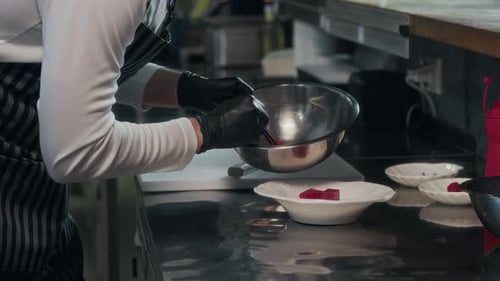 Chef Prepares Food with Chopsticks in Commercial Kitchen