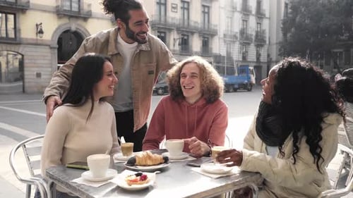 Group of Friends Meet in the Street