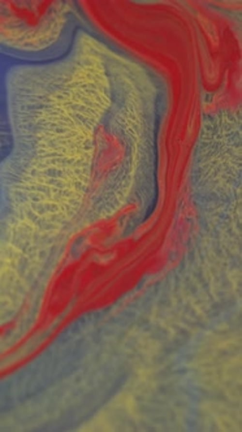 Abstract liquid fluid art background red yellow blue