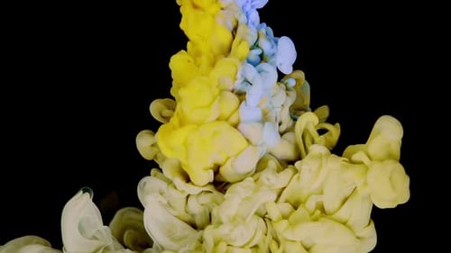 Swirling Blue and Yellow Ink in Abstract Motion