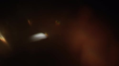 Abstract Lens Flares on Dark Background