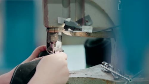 Attaching Metal to Fabric with Machine Close Up