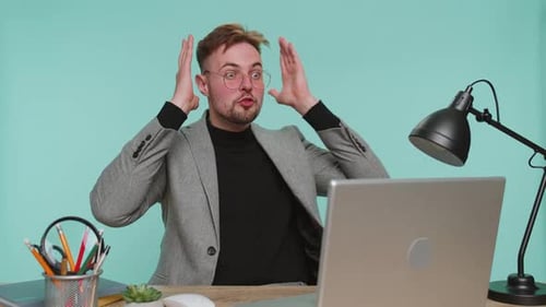 Excited Amazed Business Man Looking at Camera with Big Eyes Shocked By Sudden Victory Good News