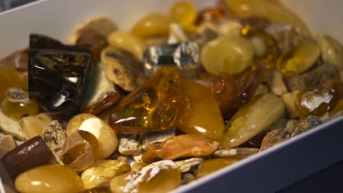 top view of big pile of raw amber stones