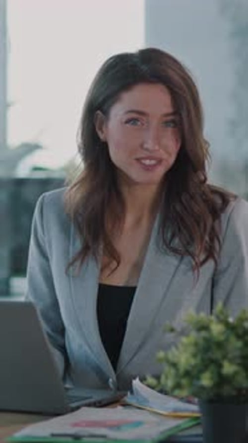 Focused Businesswoman Working in a Modern Office to Achieve Her Goals and Ambition