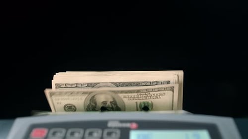 Money Counting Machine Counts Hundred Dollar Bills