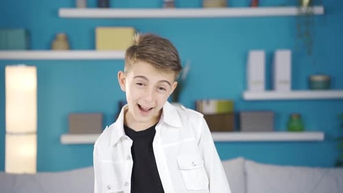 Smiling Boy Portrait in Colorful Room
