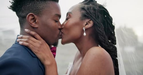 Close-up of Bride and Groom Kissing on Wedding Day
