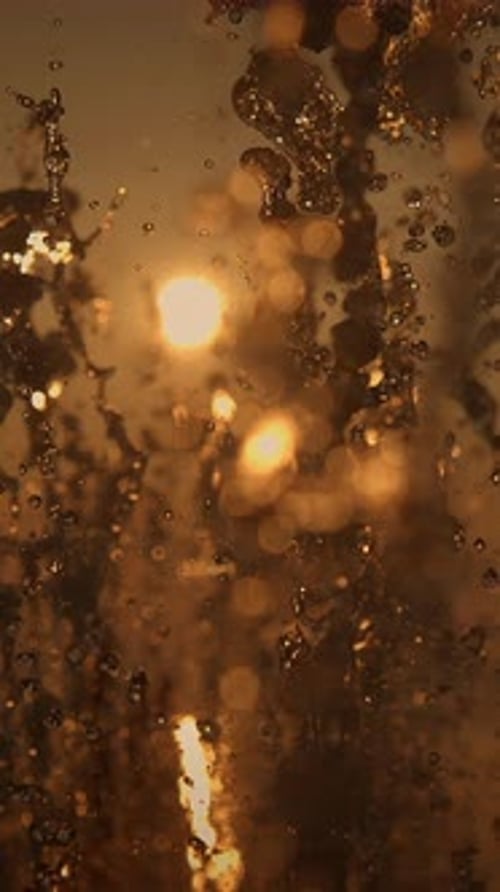 Golden Sunset and Water Splashes Create a Stunning Visual Experience for Observers