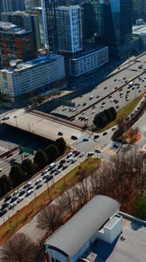 Drone flying above the busy highway in Atlanta downtown.
