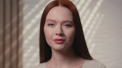 Woman Smiles and Winks at the Camera