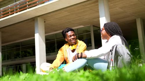 African Friends Sitting on Grass in the University Campus