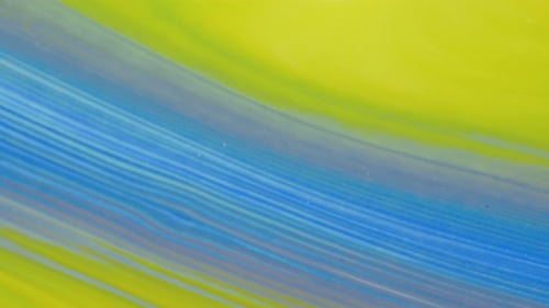 Abstract Paint Swirling Yellow and Blue