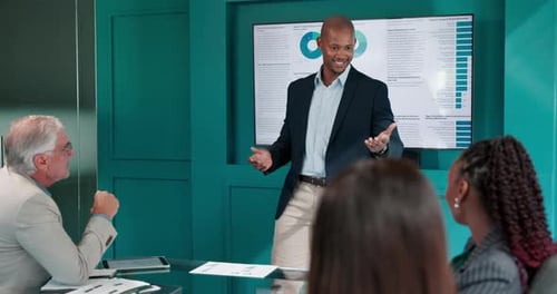 Business Team Presentation in Modern Office