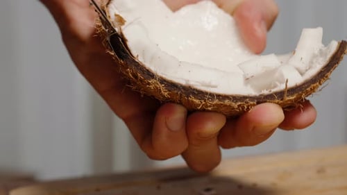 Halved Coconut Flesh Carved with Knife