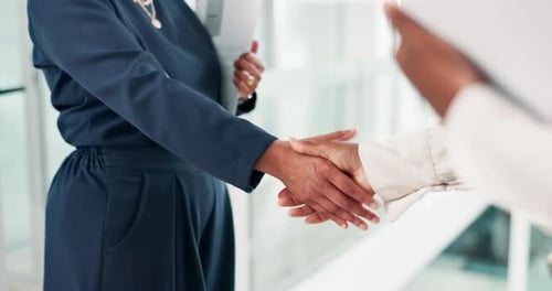 Meeting, welcome and business people with handshake, documents and b2b with onboarding job