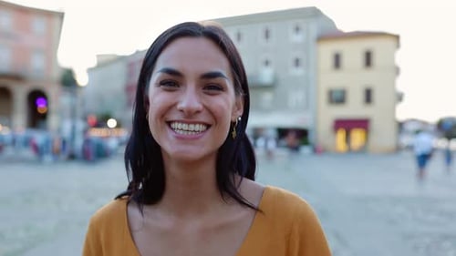 Happy Woman Smiling in City Close Up