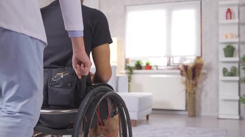 Disabled man in wheelchair in slow motion.