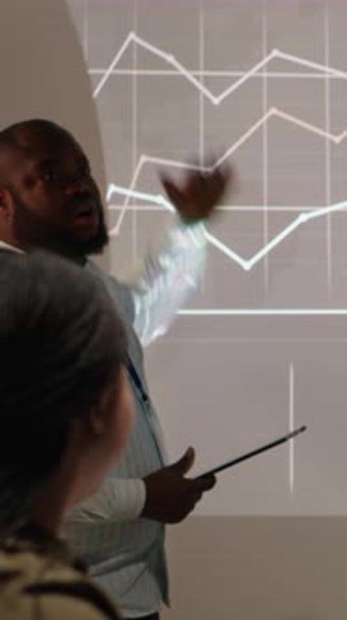 Vertical Video African American Manager Presenting Monthly Financial Situation