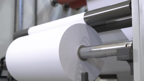 Process of Winding Paper Material Into Rolls in Factory Shop