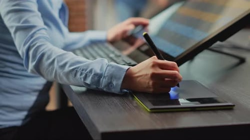 Digital Artist Working on Tablet and Computer