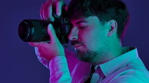 Backstage Photographer in Studio Shooting with Camera