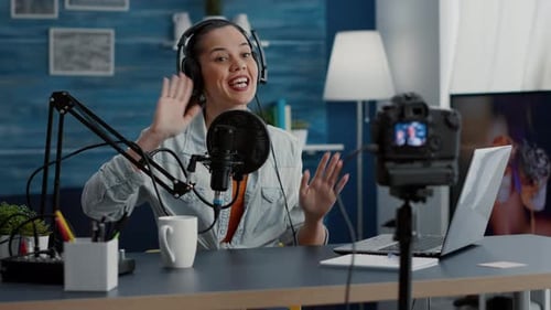 Cheerful Popular Internet Live Show Host Ending Stream While Sending Air Kisses to Public