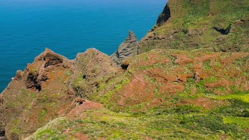 Aerial View of Rocky Volcanic Ocean Coastline with Chinamada Mountain Lanscape Hiking Area in Anaga