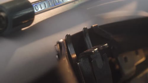 Words Cold War are Typed on a Vintage Retro Typewriter