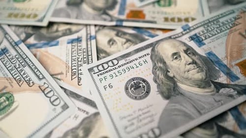 Pile of United States One Hundred Dollar Bills